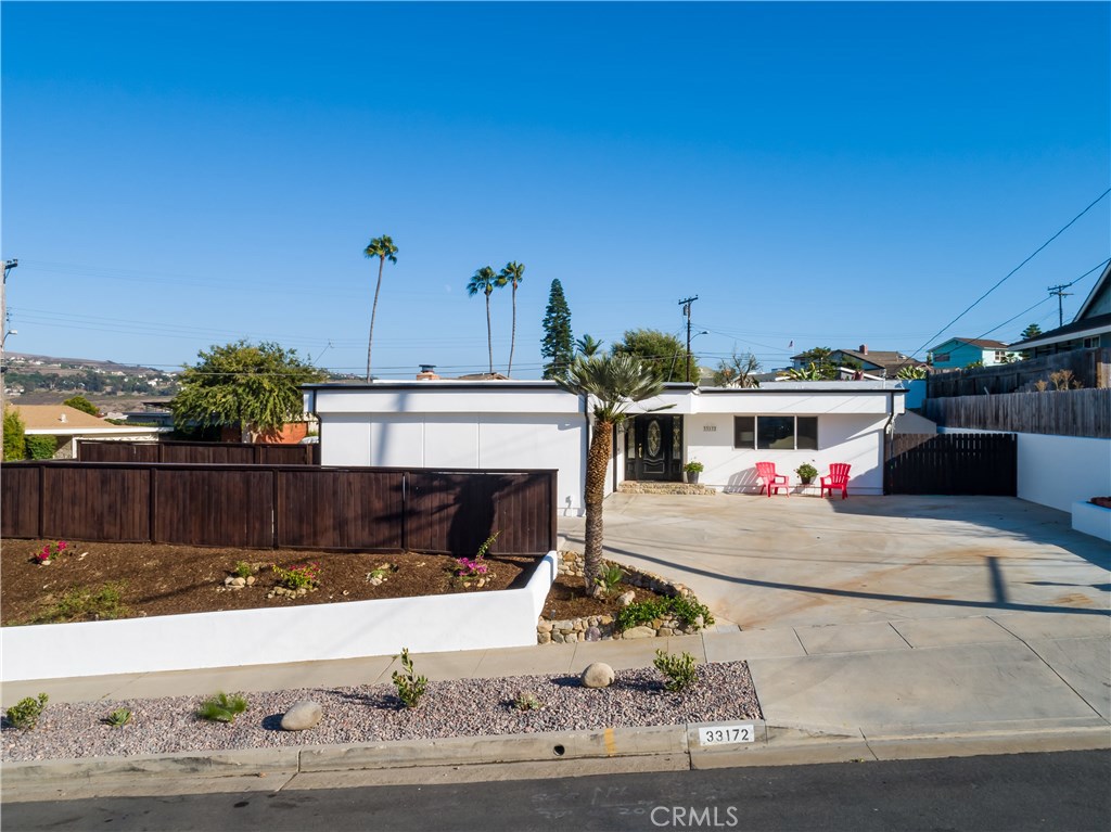 Mid-Century Modern home built on Oversized Lot. New Roof and New A/C. One Mile to Doheny Beach and Dana Point Harbor. MO - 33172 Blue Fin Drive, Dana Point CA 92629 - photo 1