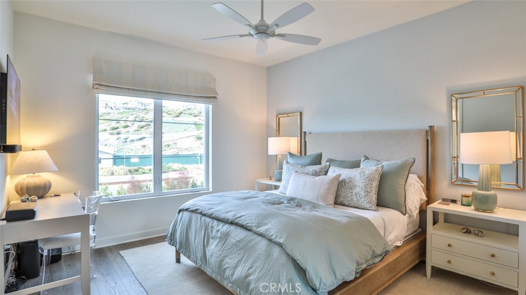 Primary suite feature walk-in closet and luxurious en-suite bath. - 3319 Doheny Way, Dana Point CA 92629 - photo 30