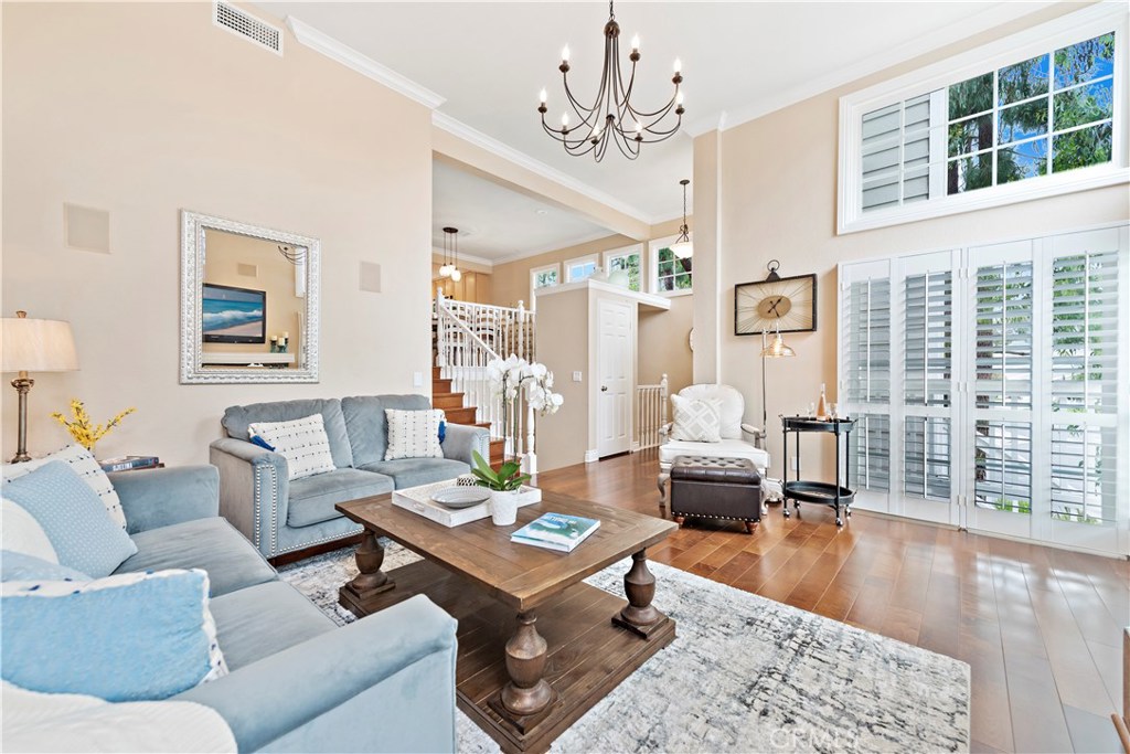Livingroom looking towards the dining room and front door - 33193 Ocean Ridge 44, Dana Point CA 92629 - photo 1