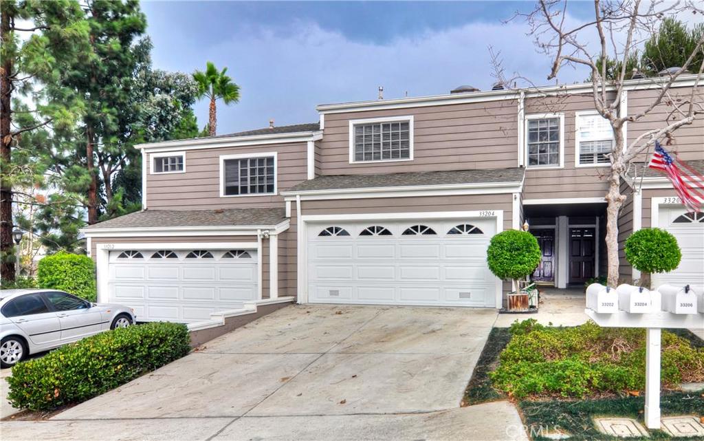 Cape Cod townhome with 2-car attached garage - 33204 Ocean Bright 11, Dana Point CA 92629 - photo 1