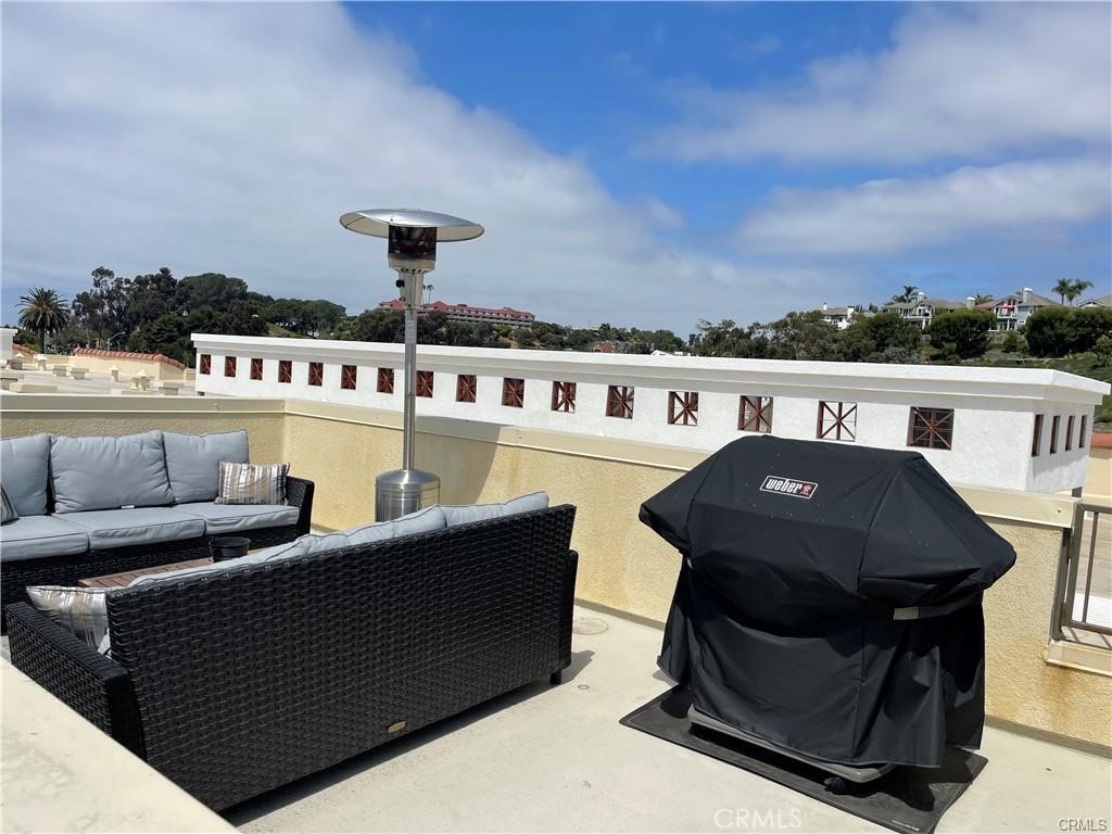 Rooftop deck with panoramic ocean, city and mountain views. - 3326 Doheny Way, Dana Point CA 92629 - photo 2