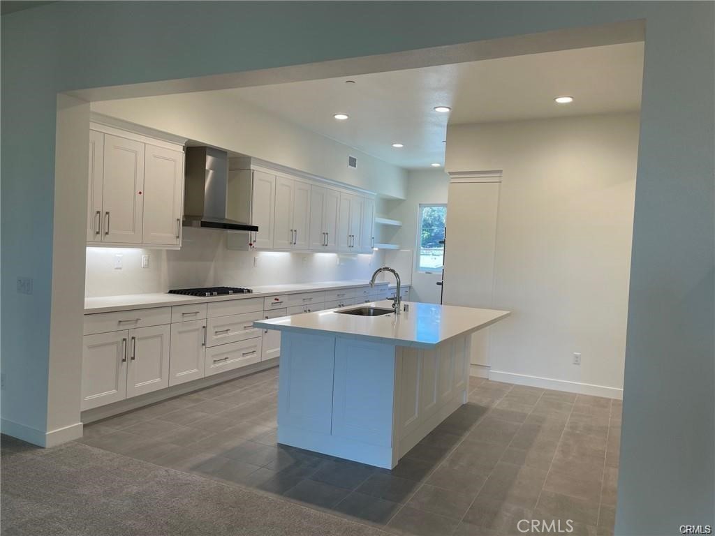 Beautiful island kitchen. Fridge is included. - 3326 Doheny Way, Dana Point CA 92629 - photo 5