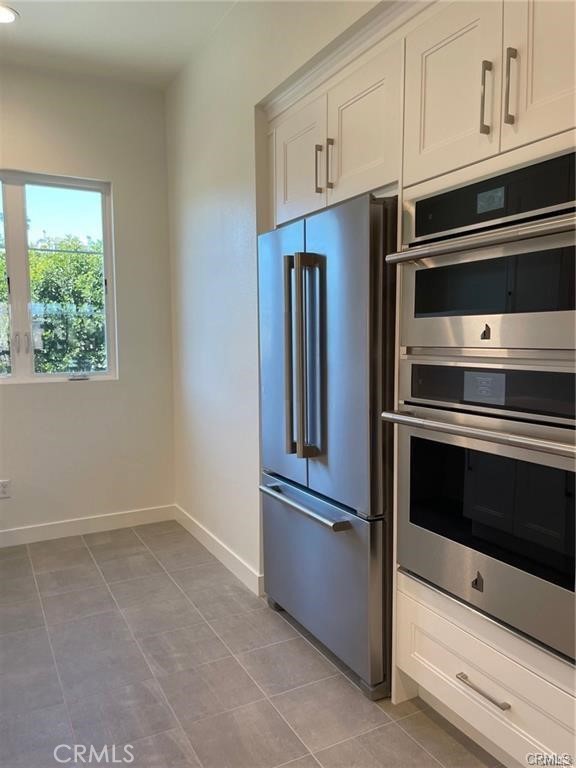 Beautiful island kitchen. Fridge is included. - 3326 Doheny Way, Dana Point CA 92629 - photo 8