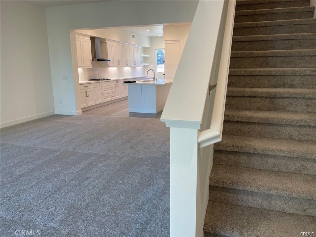 Spacious living room off of the kitchen. - 3326 Doheny Way, Dana Point CA 92629 - photo 11