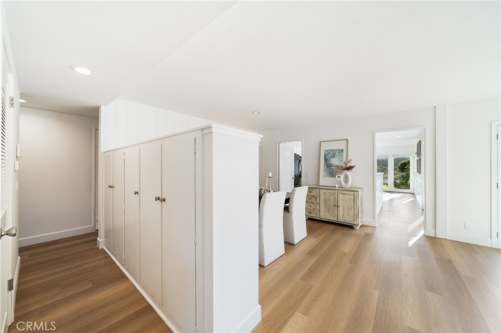 To the left, the Hallway to the Bedrooms bring privacy to the both areas. - 33261 Ocean Hill, Dana Point CA 92629 - photo 15