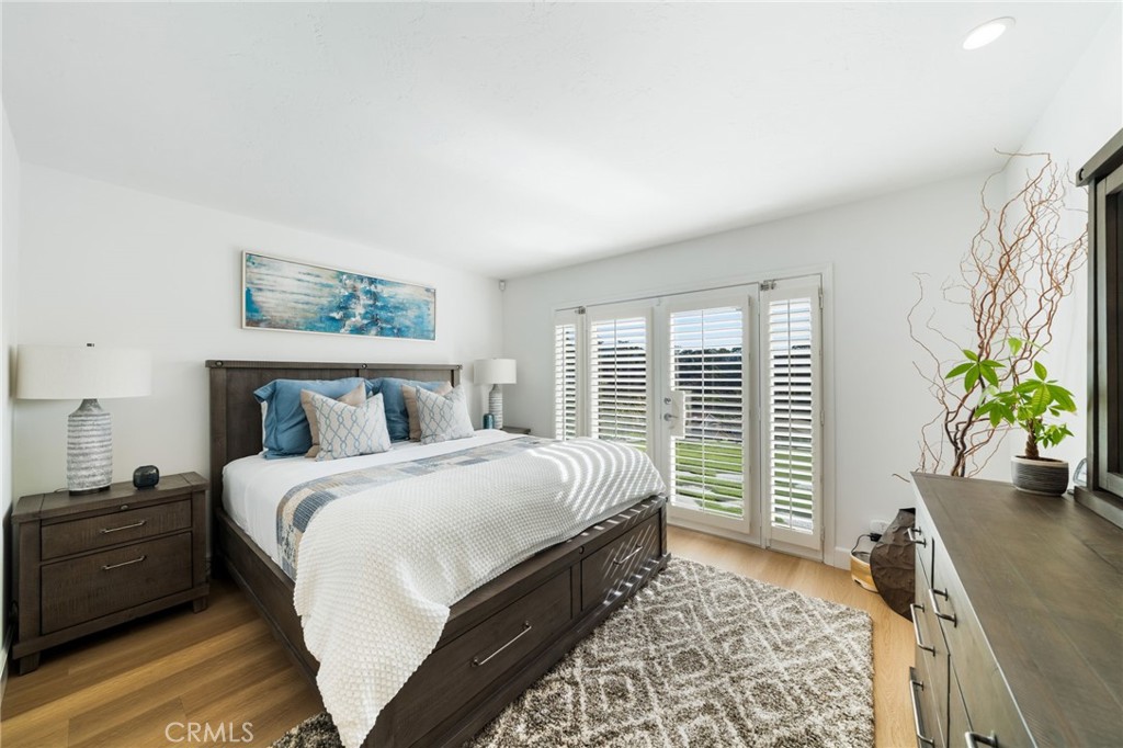 Very spacious Primary bedroom easily accommodates a King size bed as well as nightstands at each side. - 33261 Ocean Hill, Dana Point CA 92629 - photo 26