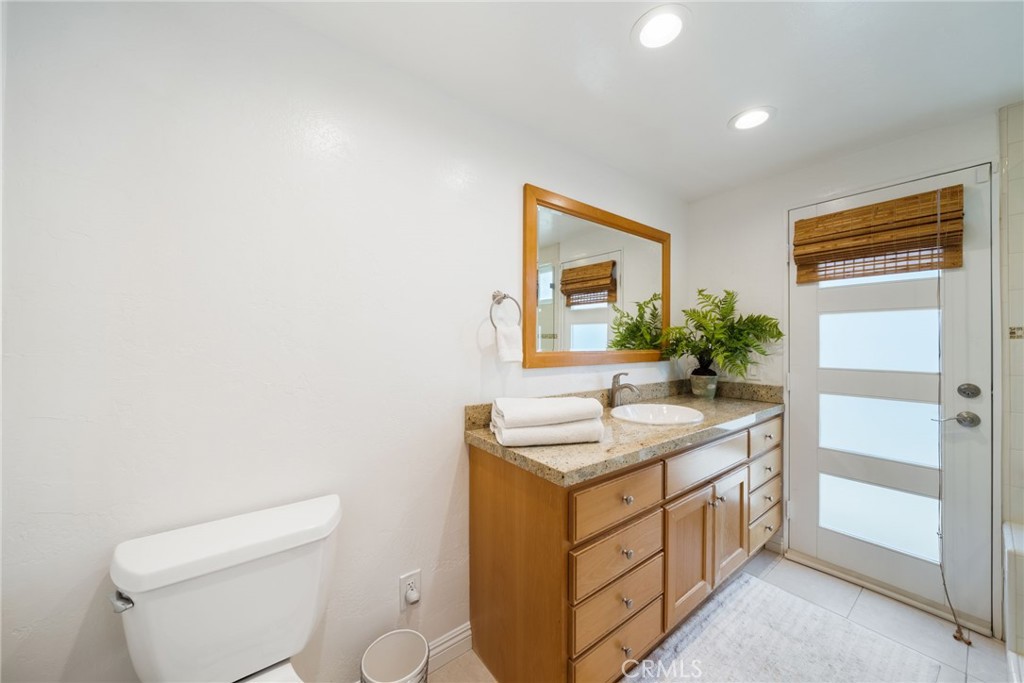 The secondary bedrooms share this bathroom. Great side entry allowing BEACH to BATH debris outside! - 33261 Ocean Hill, Dana Point CA 92629 - photo 32