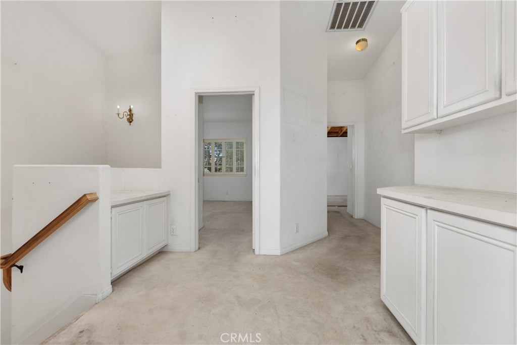Upstairs Hallway with linen closet - 33292 Ocean Ridge, Dana Point CA 92629 - photo 21