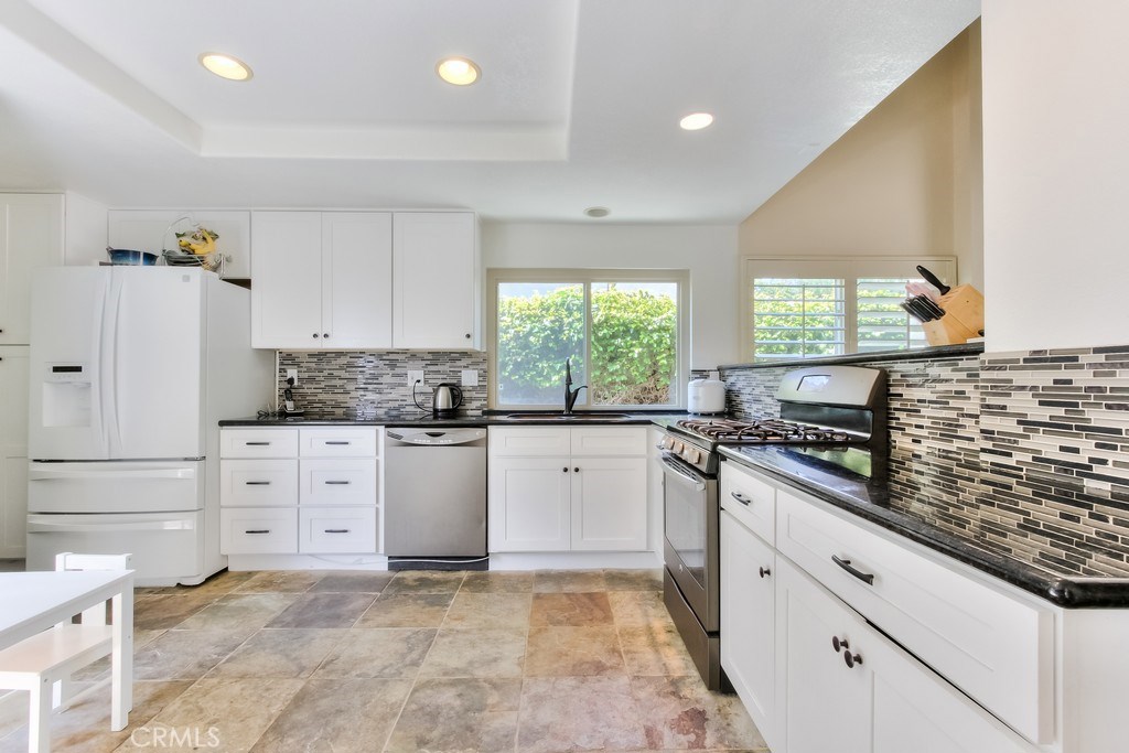 Remodeled Kitchen with Granite Counters and Slate Floors - 33502 Dosinia Drive, Dana Point CA 92629 - photo 1