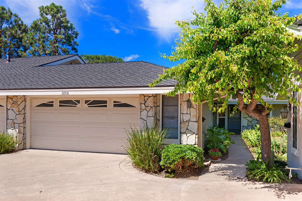Spacious 2 car garage with direct access. - 33516 Seawind Ct 41, Dana Point CA 92629 - photo 1