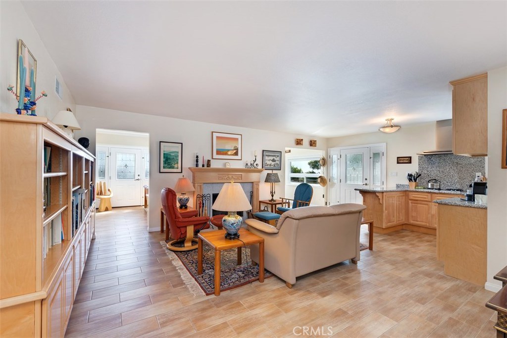Built in bookcases and open kitchen / living room make for easy entertaining. - 33601 Moonsail Drive, Dana Point CA 92629 - photo 1