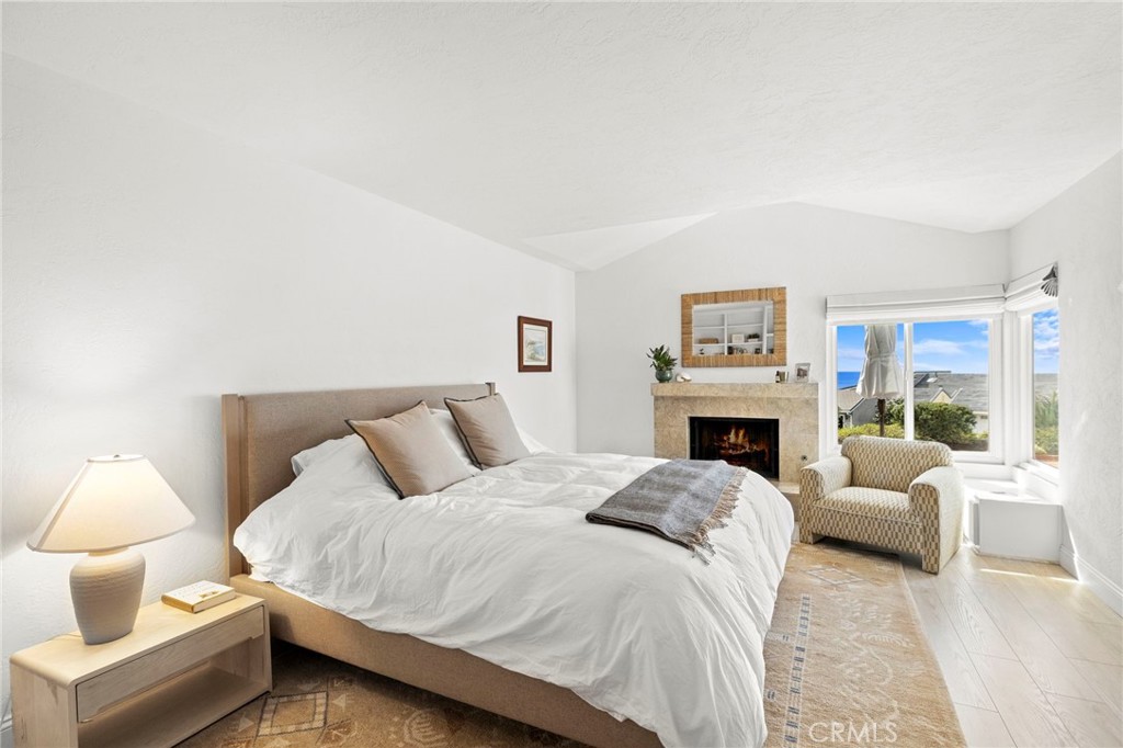 Primary bedroom Suite w/ fireplace and views - 33611 Flying Jib, Dana Point CA 92629 - photo 16