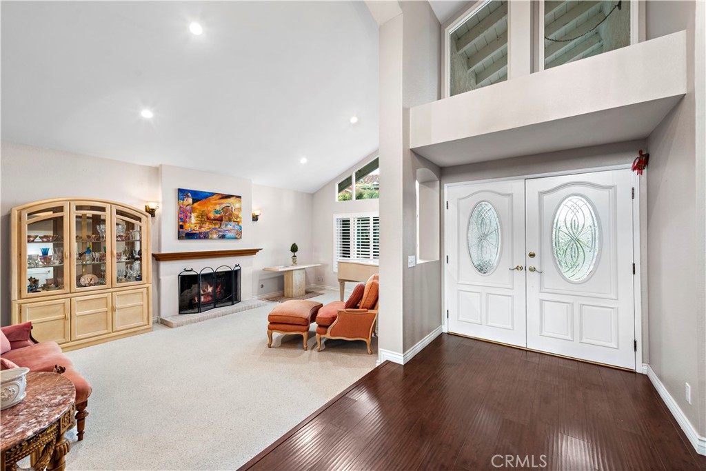 Spacious Living Room with Vaulted Ceilings, Recessed Lighting and Fireplace! - 33622 Via Martos, Dana Point CA 92629 - photo 7