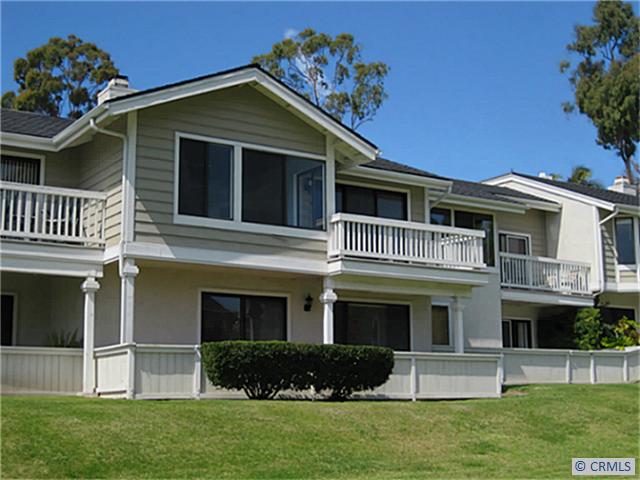 Savor the views and ocean breezes from this two-story home. - 33636 WALKABOUT Lane, Dana Point CA 92629 - photo 1