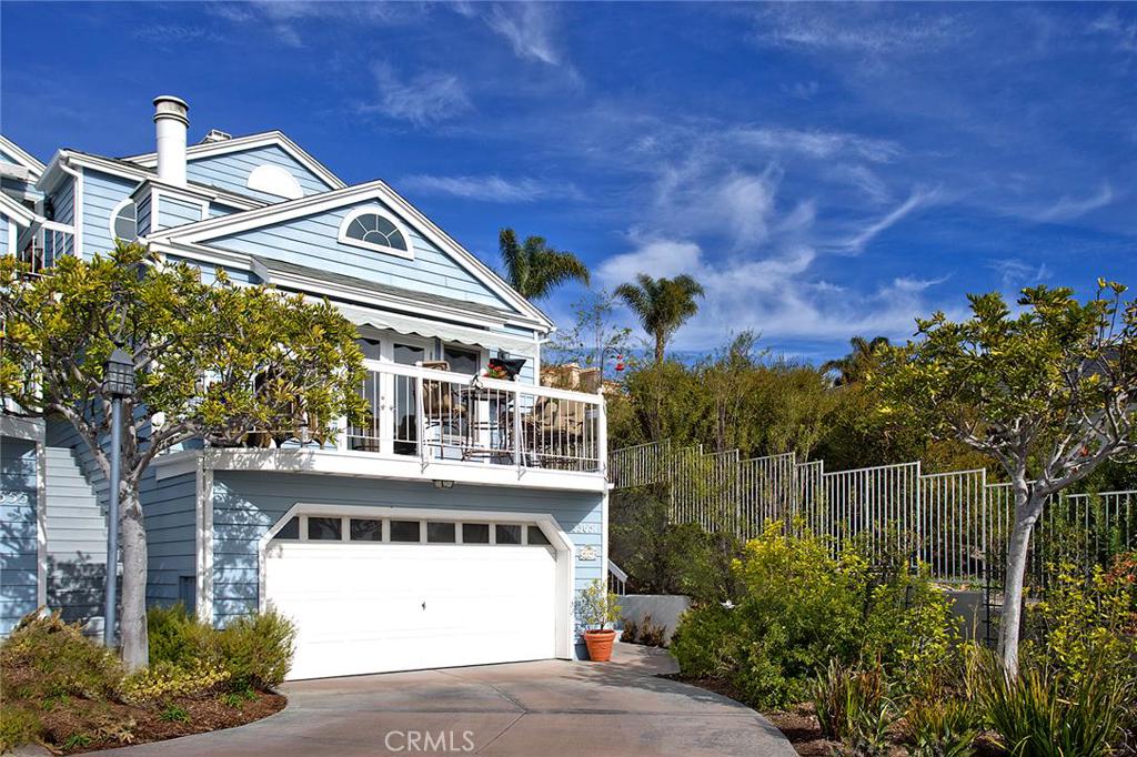 Welcome to Dana By The Sea....this is an end unit with an extra large driveway. This unit is very private. - 33651 Granada Drive 9, Dana Point CA 92629 - photo 1