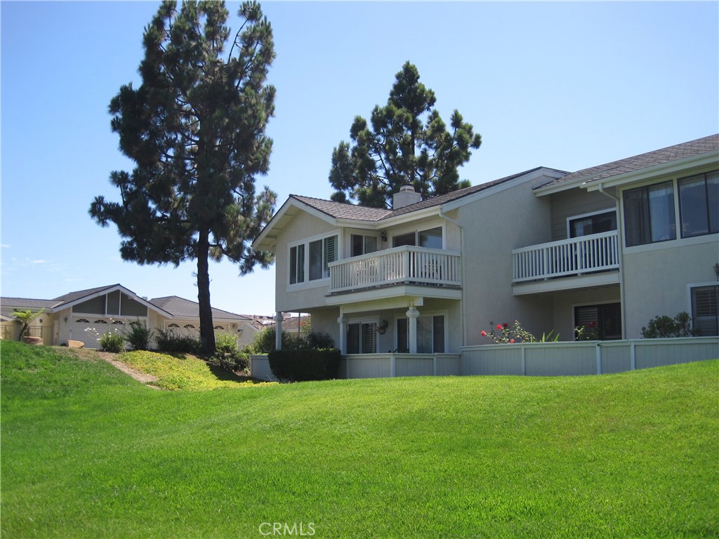 Located on a spacious greenbelt with ocean and city lights views - 33652 Walkabout Lane, Dana Point CA 92629 - photo 1