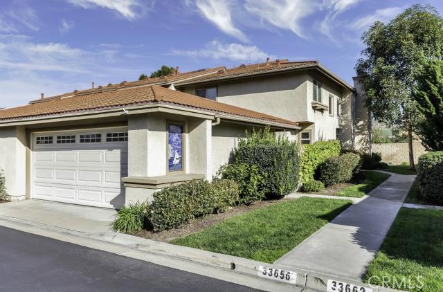 Sparkling end unit, tucked away on a quiet interior street with no homes behind and only one common wall. - 33656 Scottys Cove Drive, Dana Point CA 92629 - photo 1