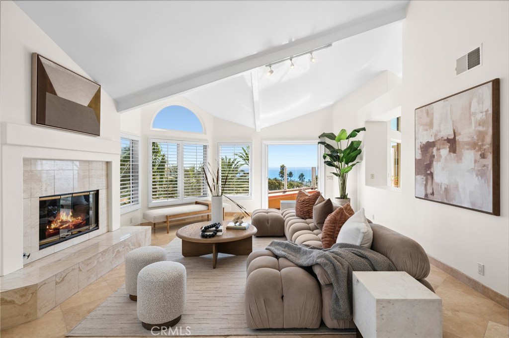 Spanning approximately 3,787 square feet, this home features four bedrooms plus an office, multiple living spaces, and e - 33682 Holtz Hill Drive, Dana Point CA 92629 - photo 1
