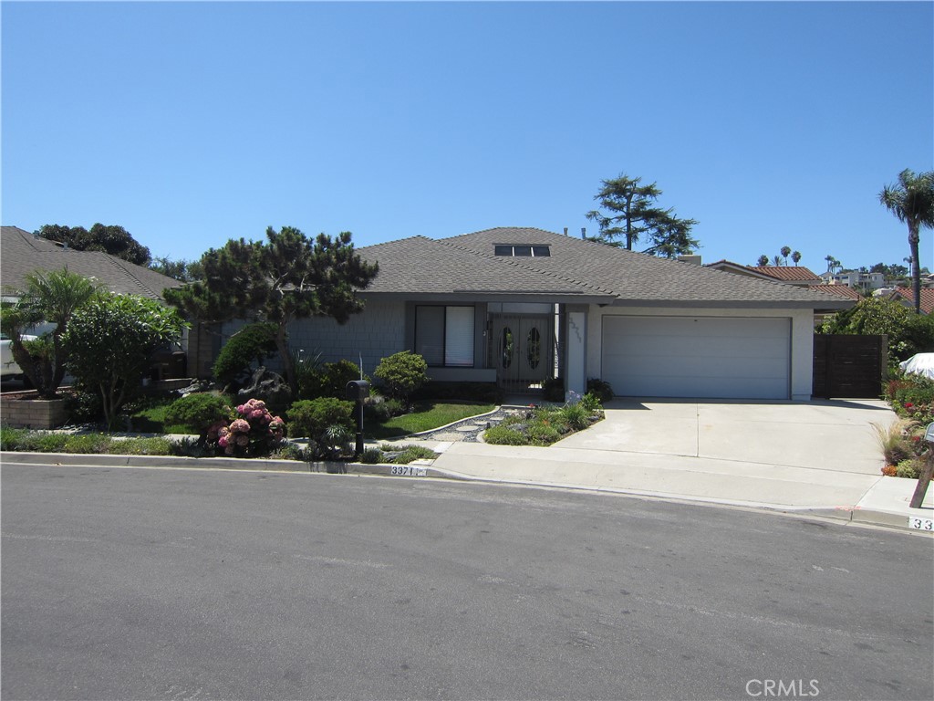 View of Home from Cul-De-Sac. Roomy Driveway with Gate to Side Yard on the right. - 33711 OLDBRIDGE Road, Dana Point CA 92629 - photo 1