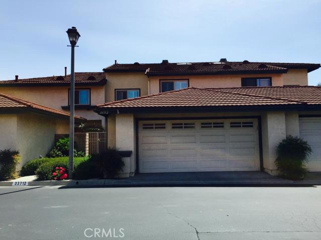 TWO CAR ATTACHED GARAGE, DIRECT ACCESS INTO HOME - 33712 Surfside Drive 147, Dana Point CA 92629 - photo 1