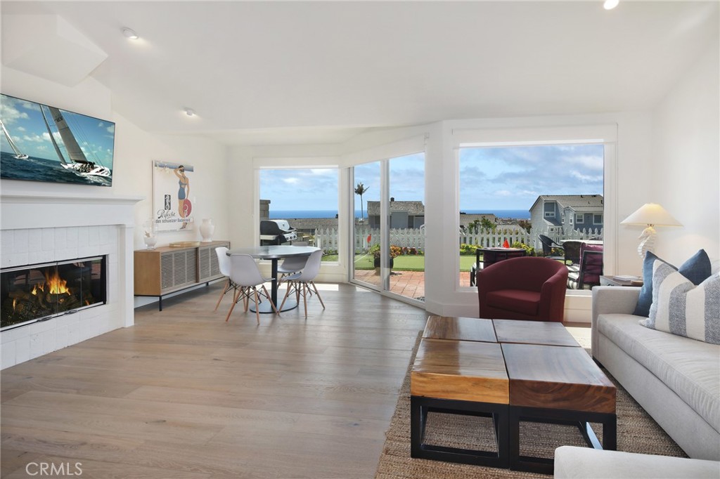 VAULTED CEILINGS IN LIVING ROOM WITH OPEN-CONCEPT DESIGN - 33721 Flying Jib Drive, Dana Point CA 92629 - photo 4