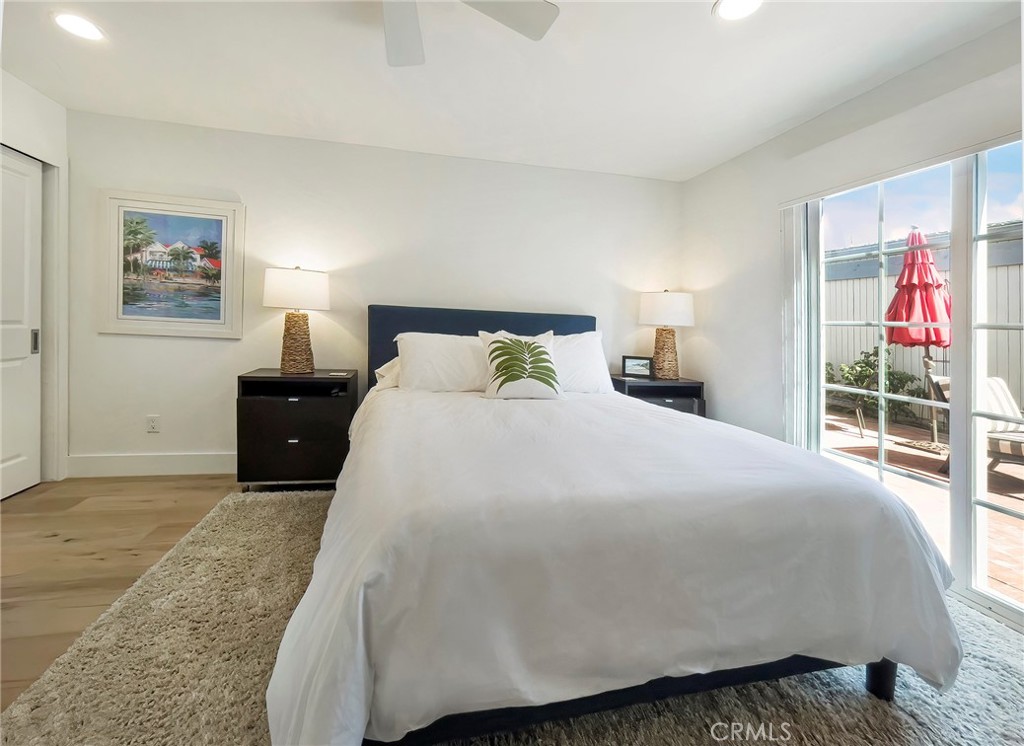 GUEST BEDROOM OPENS TO FRONT PATIO - 33721 Flying Jib Drive, Dana Point CA 92629 - photo 9