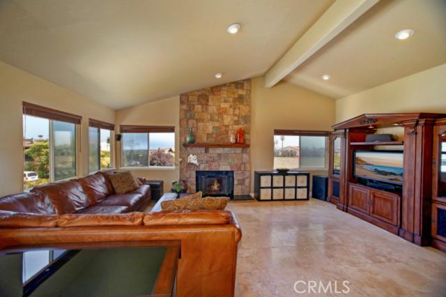 Open Floor Plan Townhouse Featuring the Spacious Family Room with Ocean Views, Travertine Flooring, Vaulted Ceilings, Re - 33751 Castano Drive 3, Dana Point CA 92629 - photo 1