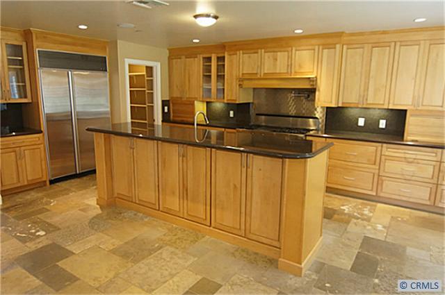 Gourmet Kitchen with granite counter, sub zero fridge, & chefs cooktop. - 33751 OLDBRIDGE Road, Dana Point CA 92629 - photo 1