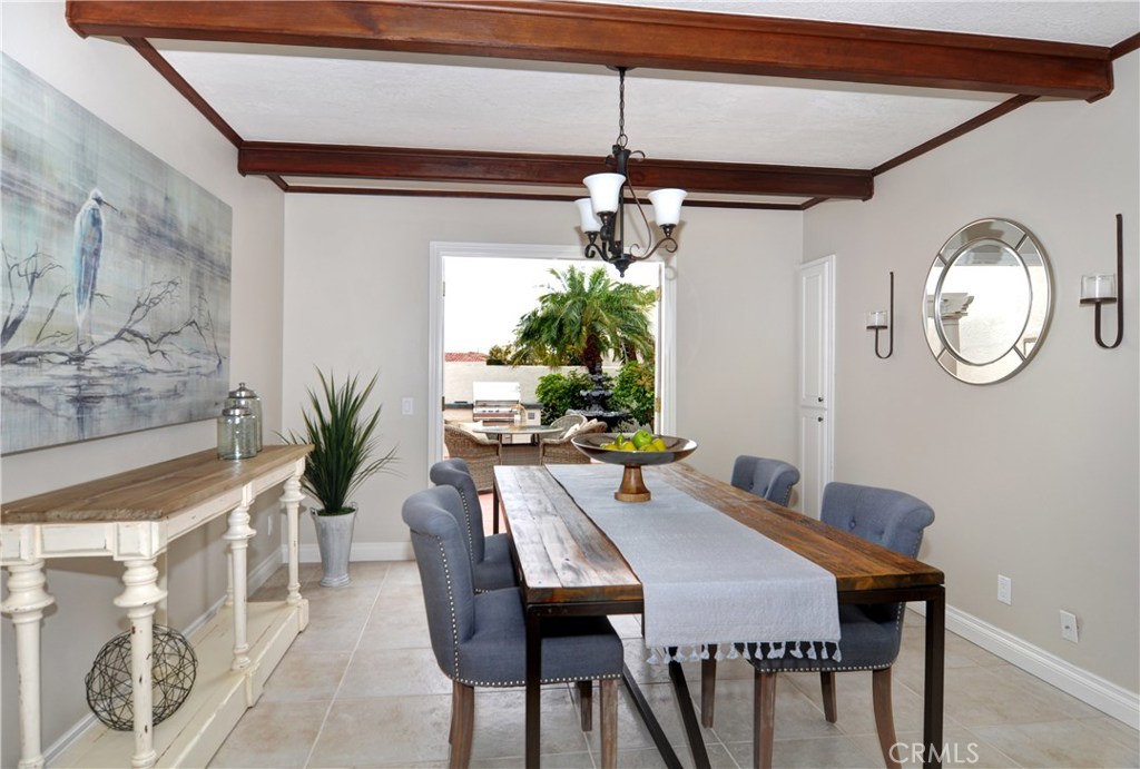 Gorgeous family kitchen, with high-beamed ceilings, french doors, and plenty of light. - 33785 Vista Grande, Dana Point CA 92629 - photo 1