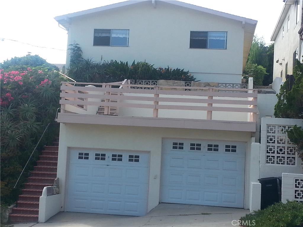 Front of duplex with individual garages + additional driveway parking. - 33815 Malaga Drive, Dana Point CA 92629 - photo 1
