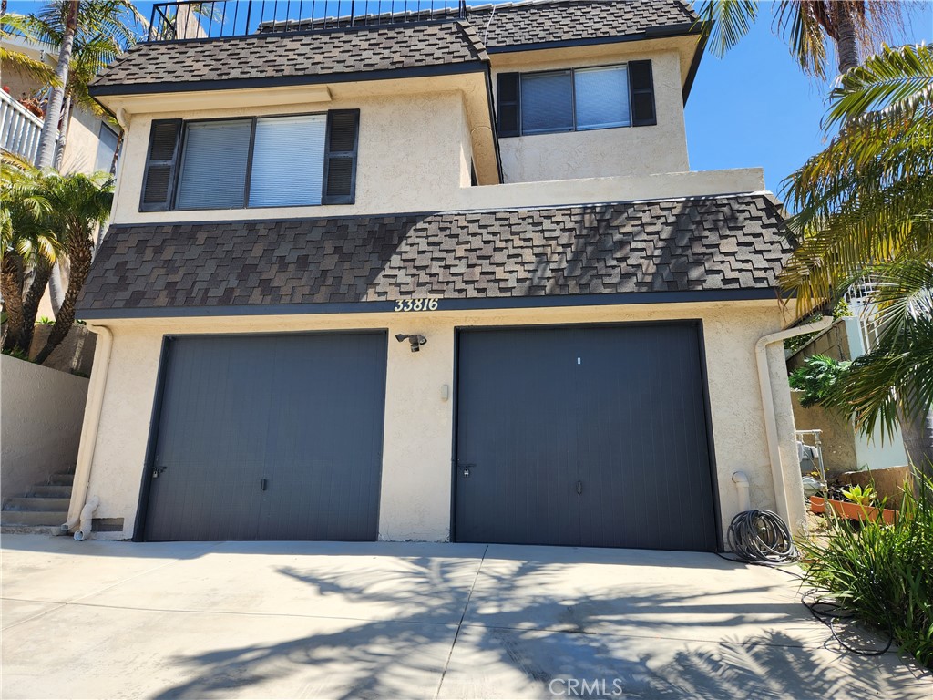 One Car Garage Plus Extra Parking Behind Garage - 33816 Silver Lantern Street, Dana Point CA 92629 - photo 1