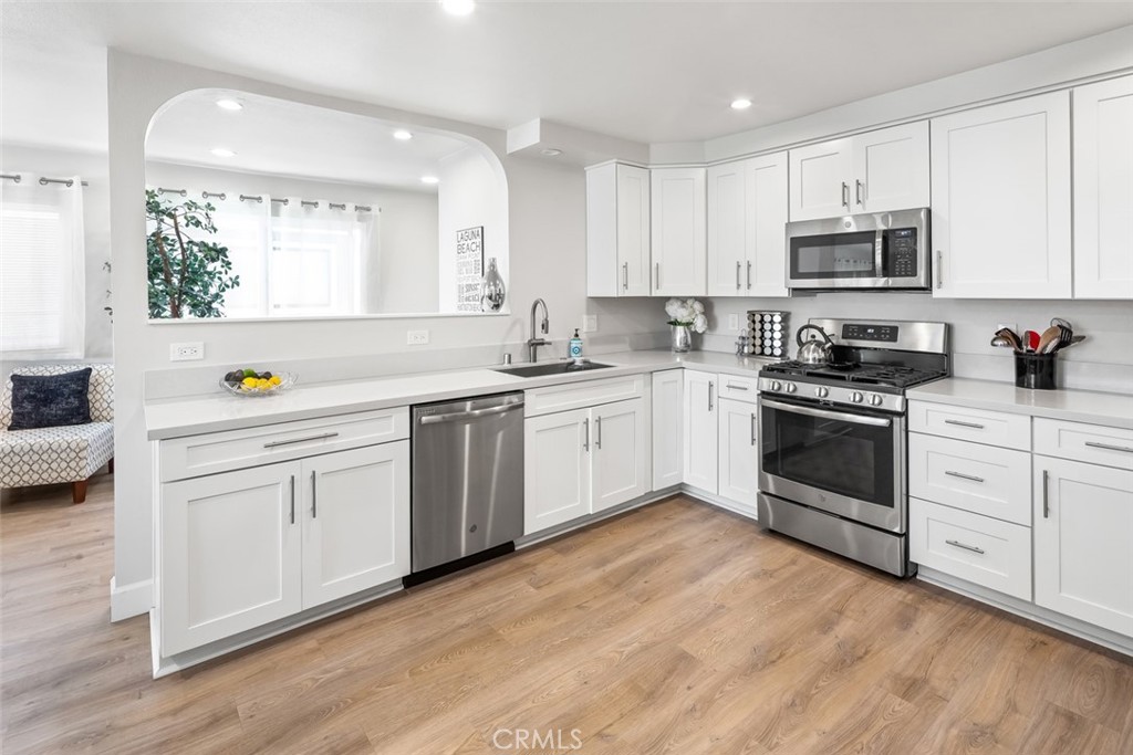 Renovated spacious kitchen with stainless steel appliances. - 33831 El Encanto Avenue A, Dana Point CA 92629 - photo 1