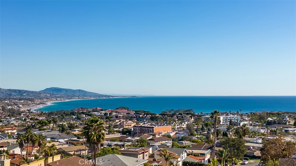 Amazing white water coastal views from the interior and exterior of the property. - 33831 El Encanto Avenue C, Dana Point CA 92629 - photo 1