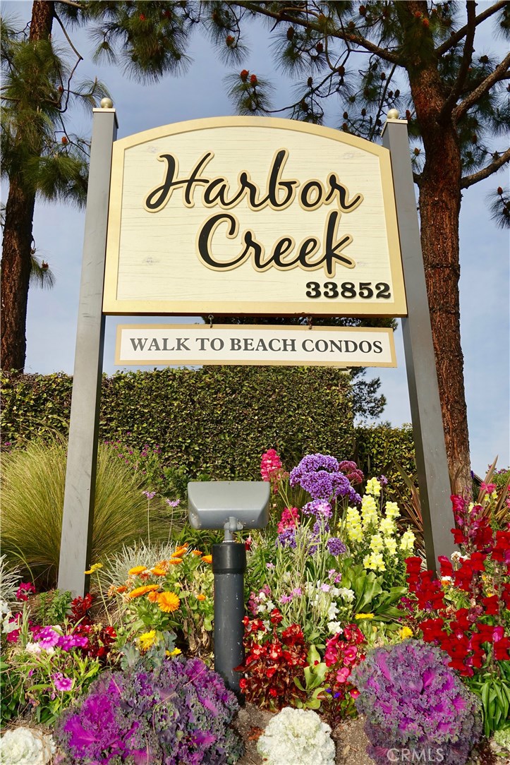 Walk to Doheny Beach from this lovely 1 bedroom unit in quiet well maintained Harbor Creek! - 33852 Del Obispo Street 122, Dana Point CA 92629 - photo 1