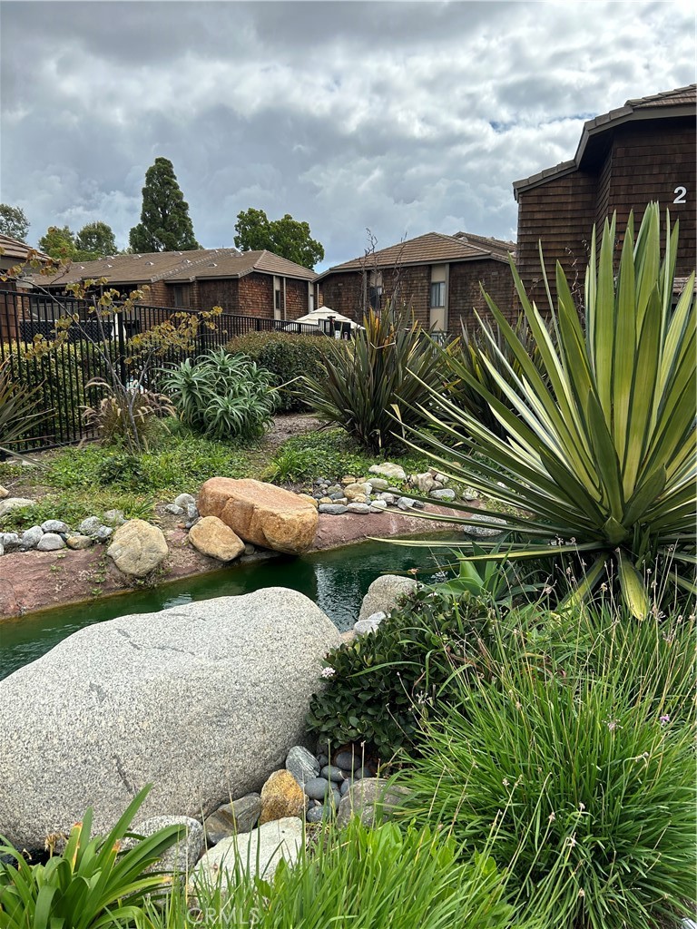 Entrance to Harbor Creek Complex with streams running throughout - 33852 Del Obispo Street 51, Dana Point CA 92629 - photo 2