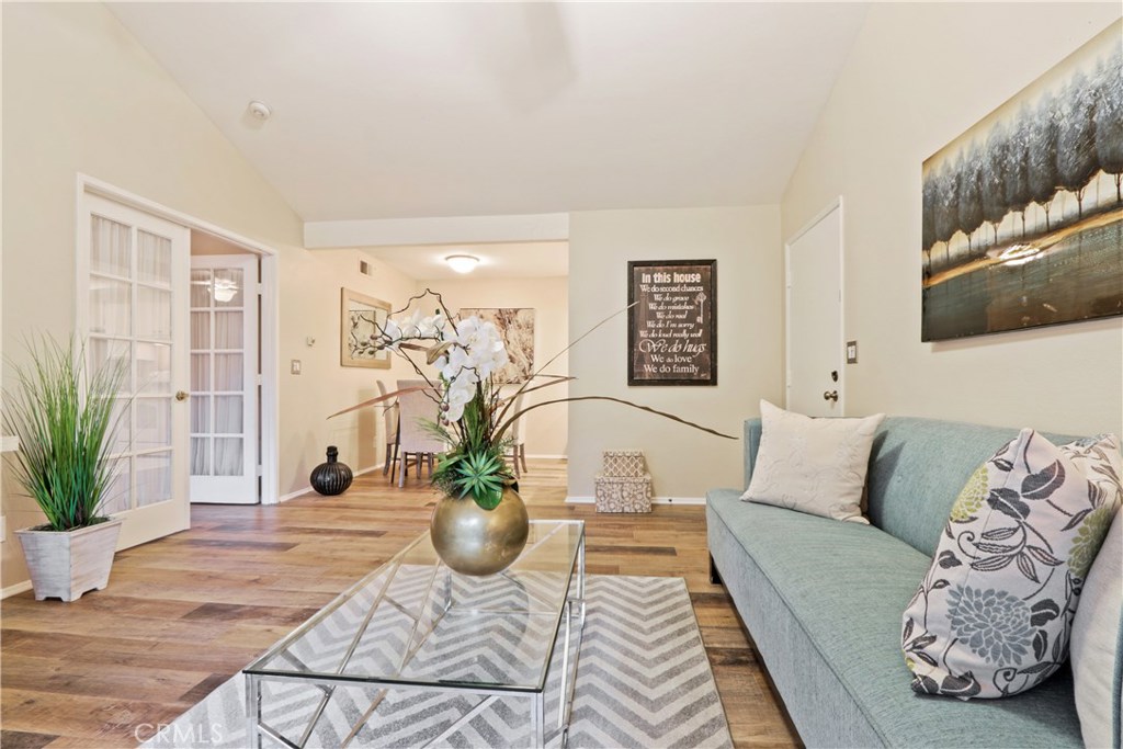 Wonderful open floor plan with French doors leading to master bedroom. - 33852 Del Obispo Street 90, Dana Point CA 92629 - photo 1