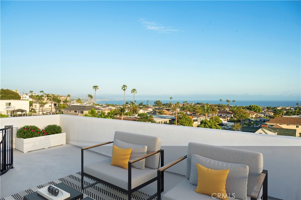Roof Top Deck with expansive panoramic White Water Ocean View Photo has been virtually staged - 33853 Malaga, Dana Point CA 92629 - photo 1