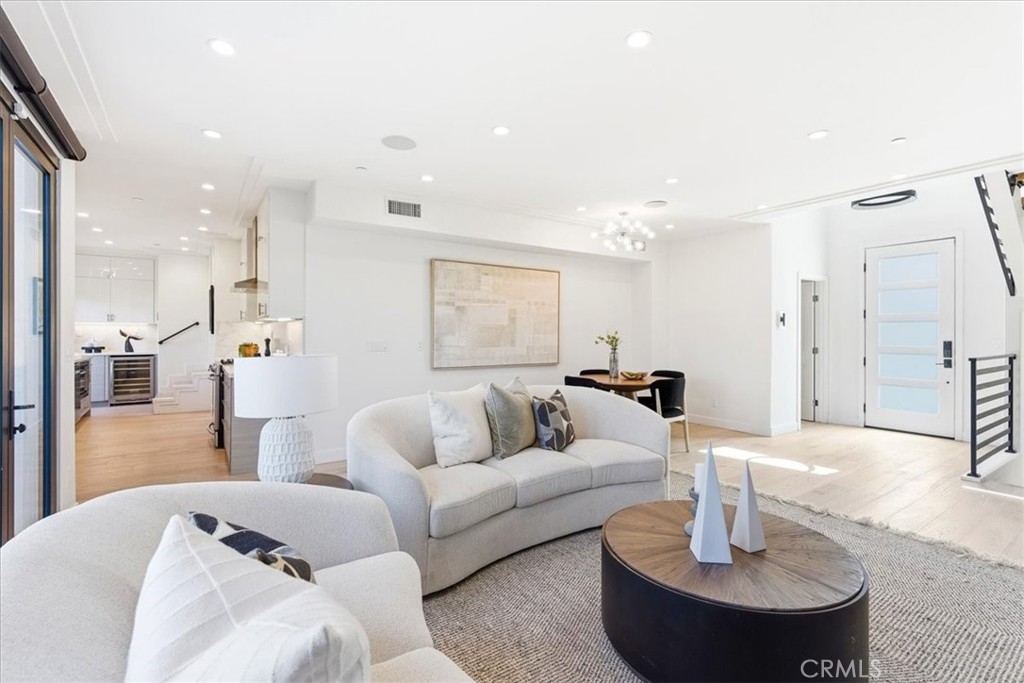 Open living area showcasing clean architectural lines and a bright, inviting atmosphere. - 33871 Calle La Primavera, Dana Point CA 92629 - photo 8