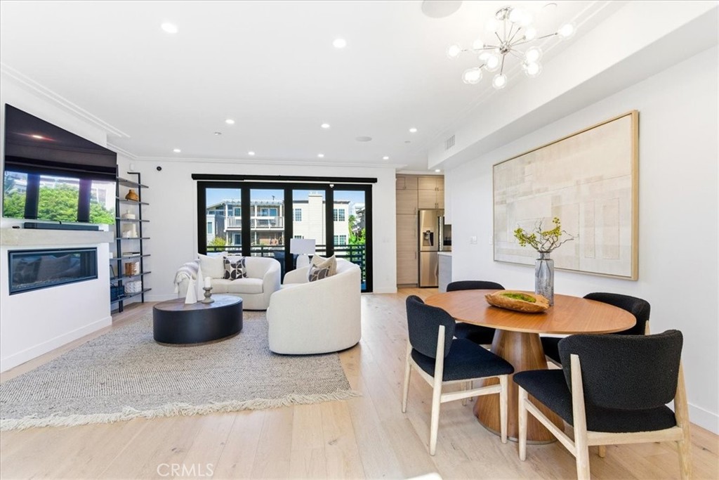 Alternate view of the dining and living areas emphasizing the home's functional layout. - 33871 Calle La Primavera, Dana Point CA 92629 - photo 10