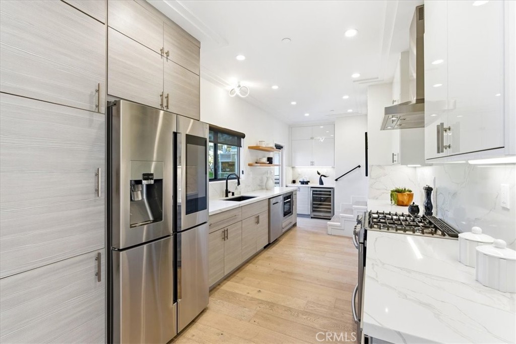 Chef-inspired kitchen with premium appliances, generous cabinetry, and a functional layout designed for everyday conveni - 33871 Calle La Primavera, Dana Point CA 92629 - photo 13