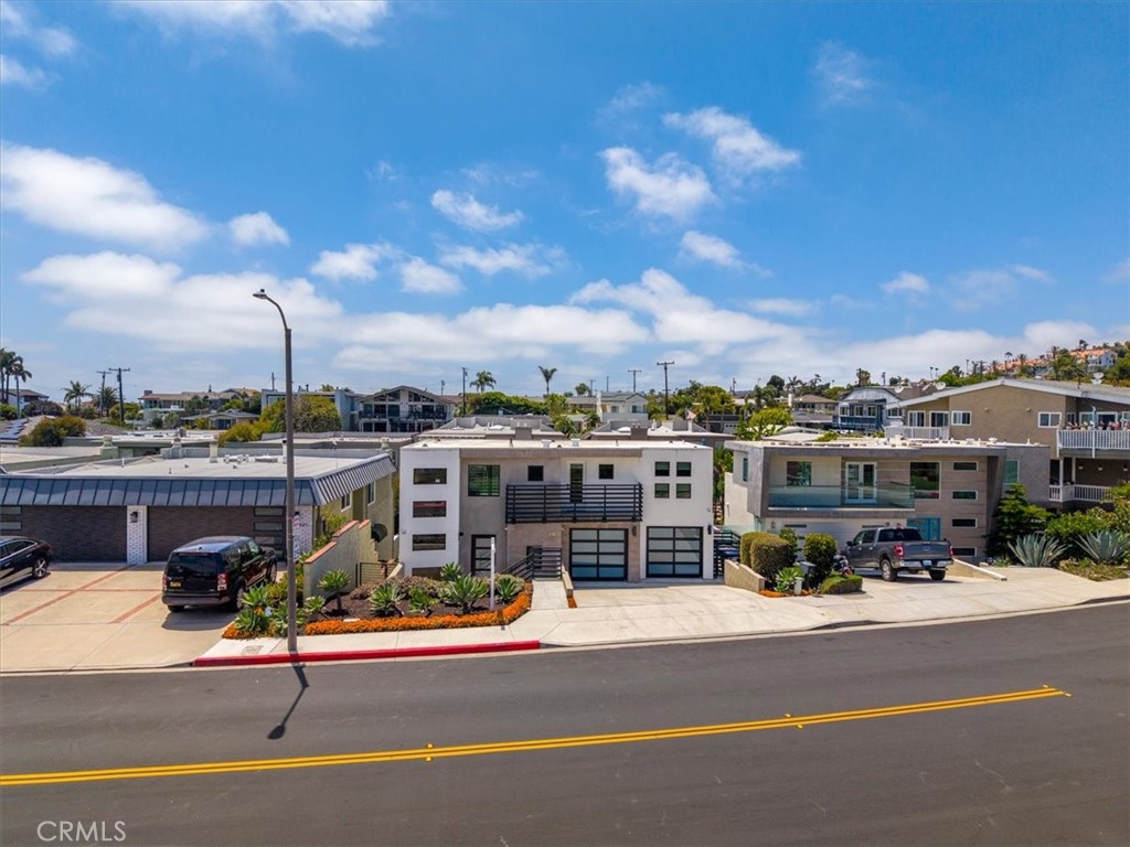 Street-facing aerial view highlighting the residence's prominent location and attractive neighborhood setting. - 33871 Calle La Primavera, Dana Point CA 92629 - photo 44