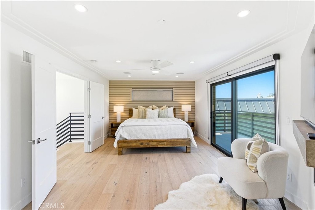 Bedroom with sliding glass doors to a balcony. - 33871 Calle La Primavera, Dana Point CA 92629 - photo 18