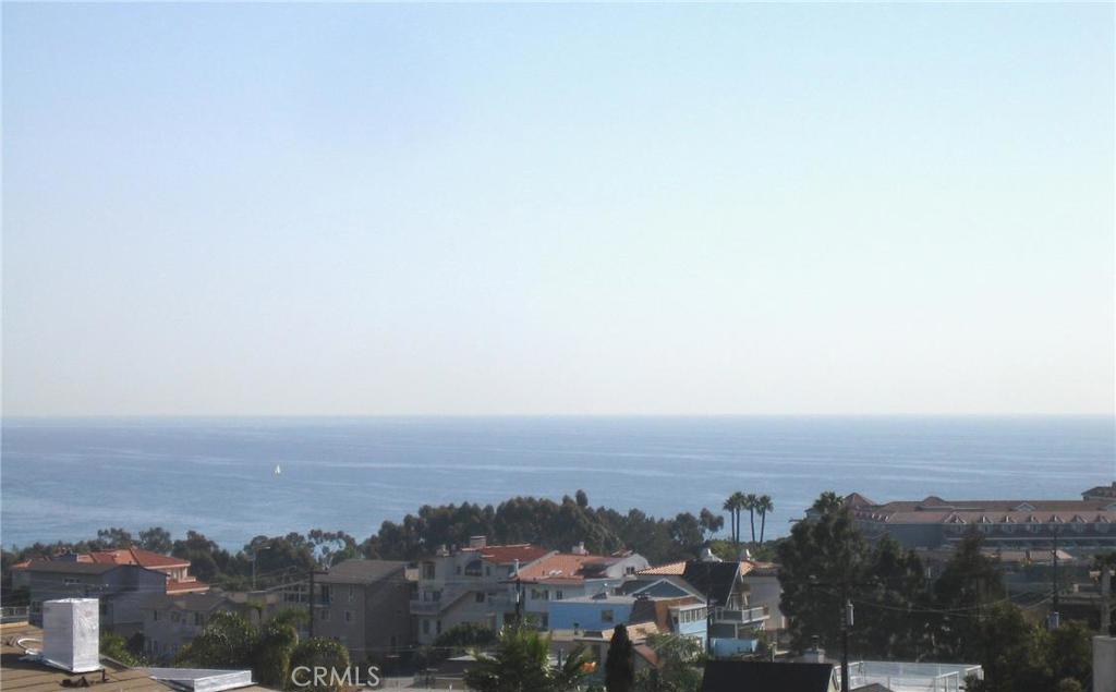 Stunning ocean view from deck off living room. - 33901 Mariana Drive 2, Dana Point CA 92629 - photo 1