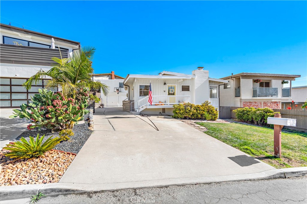 Parking spot assigned to back unit is one on right side of driveway, next to lawn - 33936 Amber Lantern Street, Dana Point CA 92629 - photo 30
