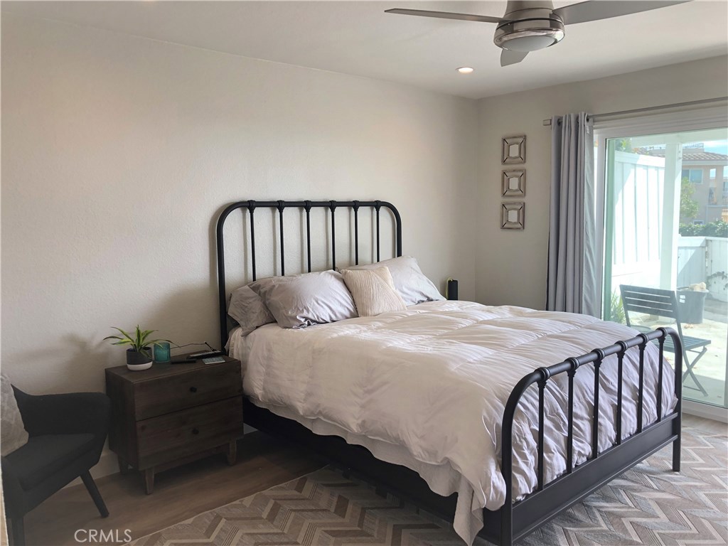 Slider entry to studio with furnishings. - 33936 Mariana Drive B, Dana Point CA 92629 - photo 1