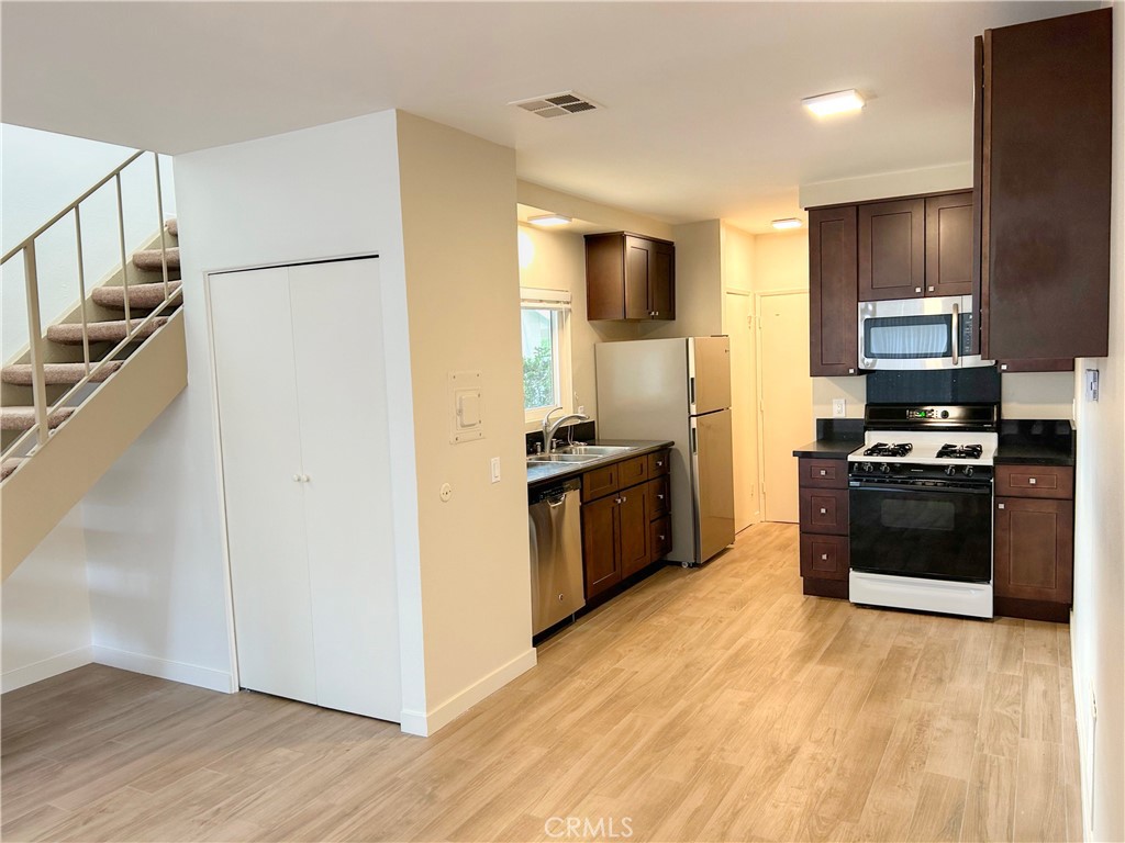 Open floor plan, porcelain tile floor. - 33938 ALCAZAR Drive A, Dana Point CA 92629 - photo 1