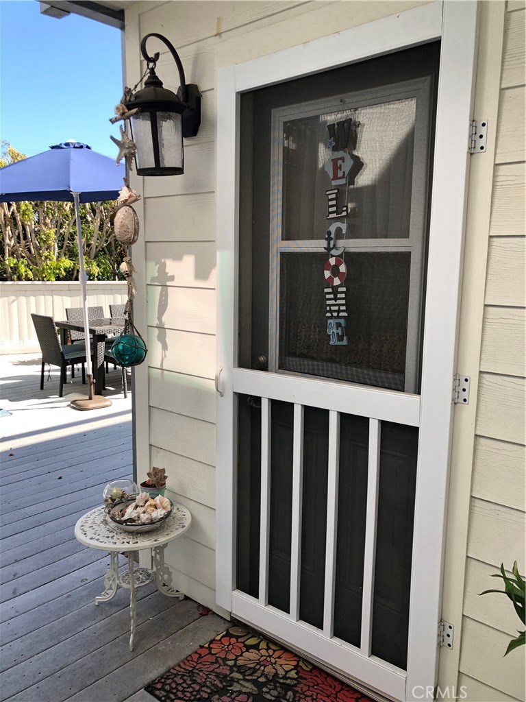 Entry door to kitchen and backyard. - 33942 Mariana Drive 3B, Dana Point CA 92629 - photo 1