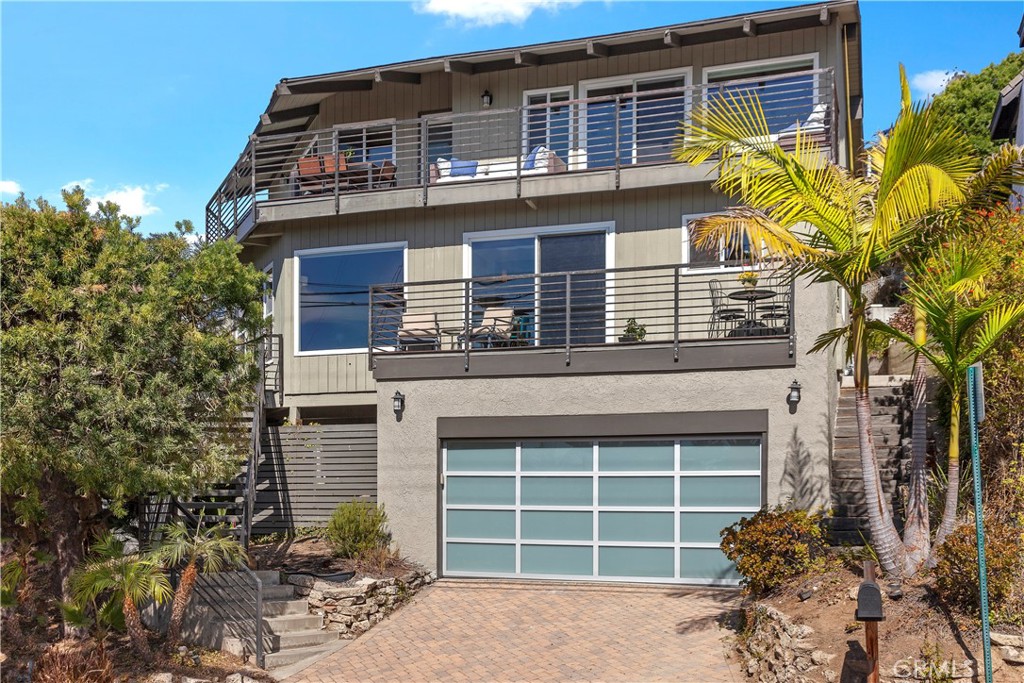 Garage and driveway make for easy parking - 33972 Crystal Lantern Street, Dana Point CA 92629 - photo 1