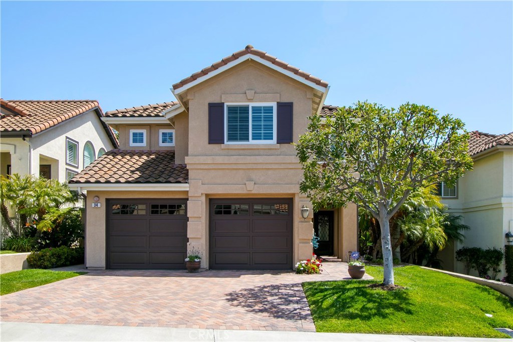 The finest in living all within the 24 hour guard-gated community of Monarch Beach. Walk to Salt Creek Beach, the Tennis - 34 Regina, Dana Point CA 92629 - photo 1