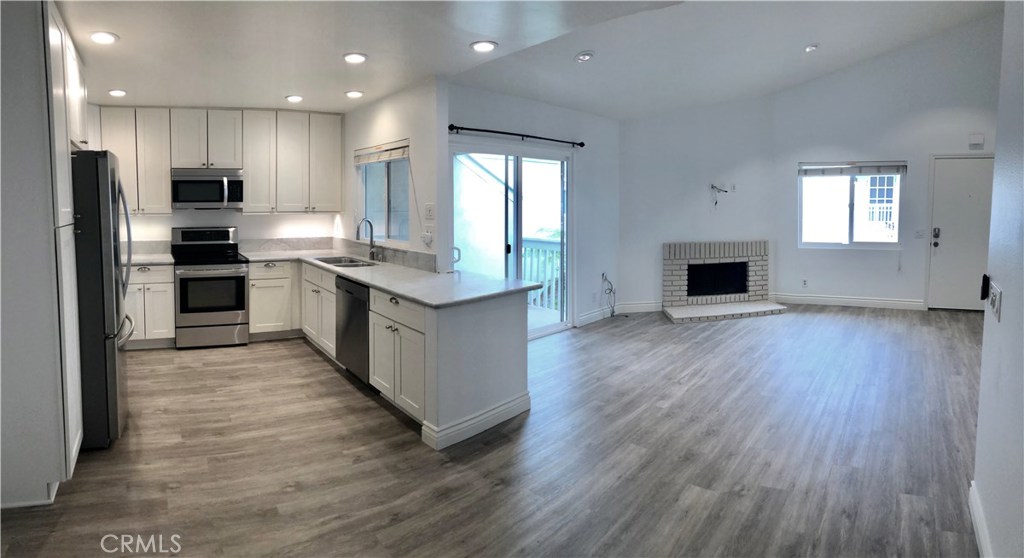 Gorgeous new flooring and light/bright cabinetry! Coastal elegance.... - 34002 Selva Road 371, Dana Point CA 92629 - photo 1